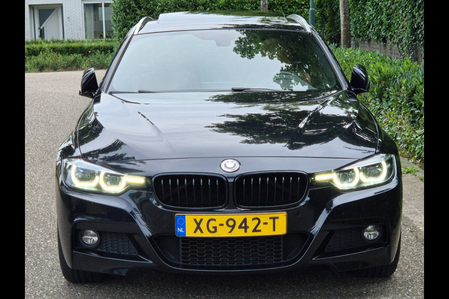 BMW 3 Serie Touring 320i M Sport Ed volle optielijst Trekhaak Pano CarPlay 19inch M Velgen Stuurverwarming NAP M Sport Edition