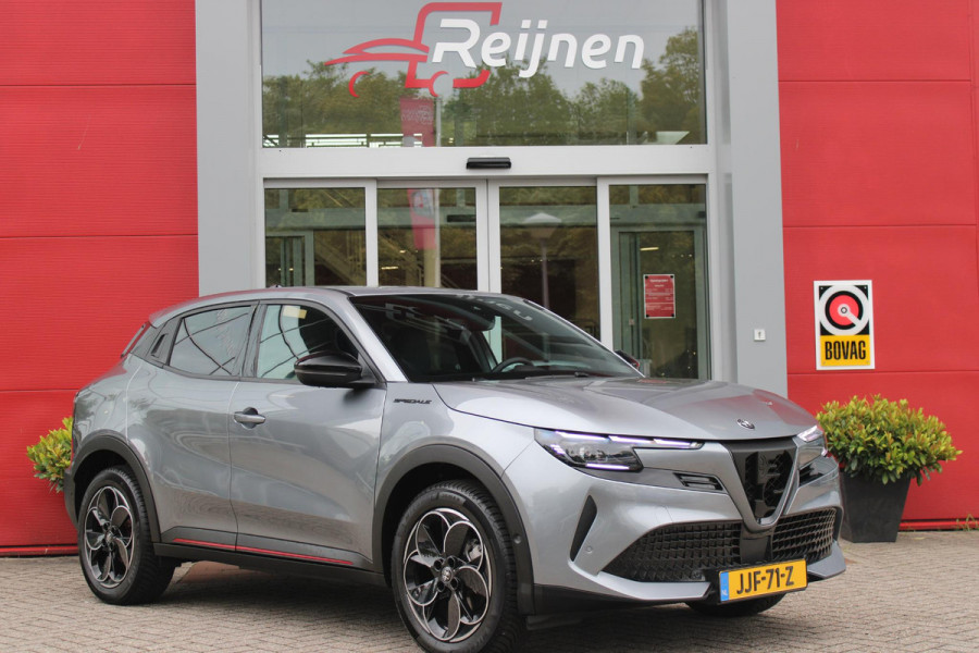 Alfa Romeo junior ELETTRICA SPECIALE 156PK 54 kWh | WARMTEPOMP | TECHNOLOGIE PAKKET (O.A. FULL LED ADAPTIVE MATRIX KOPLAMPEN/DODEHOEK DETECTIE/DRAADLOZE TELEFOONLADER/ACHTERUITRIJ CAMERA/PARKEERSENSOREN VOOR, ACHTER,ZIJKANT) | DRAADLOZE APPLE CARPLAY/ANDROID AUTO | CLIMATE CONTROL | ELEKTRISCH BEDIENBARE ACHTERKLEP | STOEL VERWARMING | ELEKTRISCH BEDIENBARE VOORSTOEL MET MASSAGE FUNCTIE | VERKEERSBORDEN HERKENNING | ADAPTIVE CRUISE CONTROL | KEYLESS ENTRY/START | ALL SEASON BANDEN | LICHTMETALEN VELGEN 18" | NAVIGATIE | DAB+ RADIO |