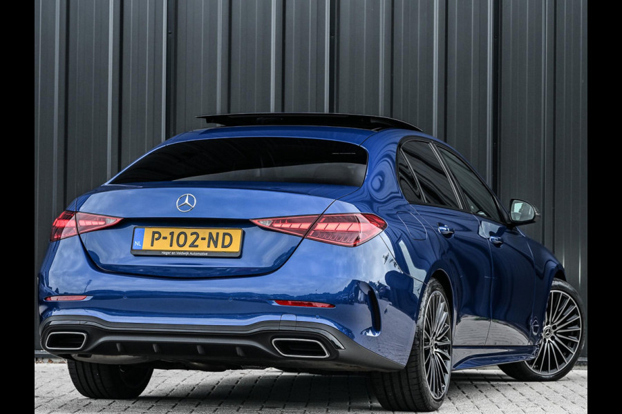 Mercedes-Benz C-Klasse 180 AMG Line | NL-Auto | Panoramadak | Night-Pakket | Ambiance Interieur | Camera | Elektr. Verst. Voorstoelen + Verwarming |