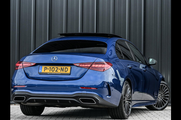Mercedes-Benz C-Klasse 180 AMG Line | NL-Auto | Panoramadak | Night-Pakket | Ambiance Interieur | Camera | Elektr. Verst. Voorstoelen + Verwarming |