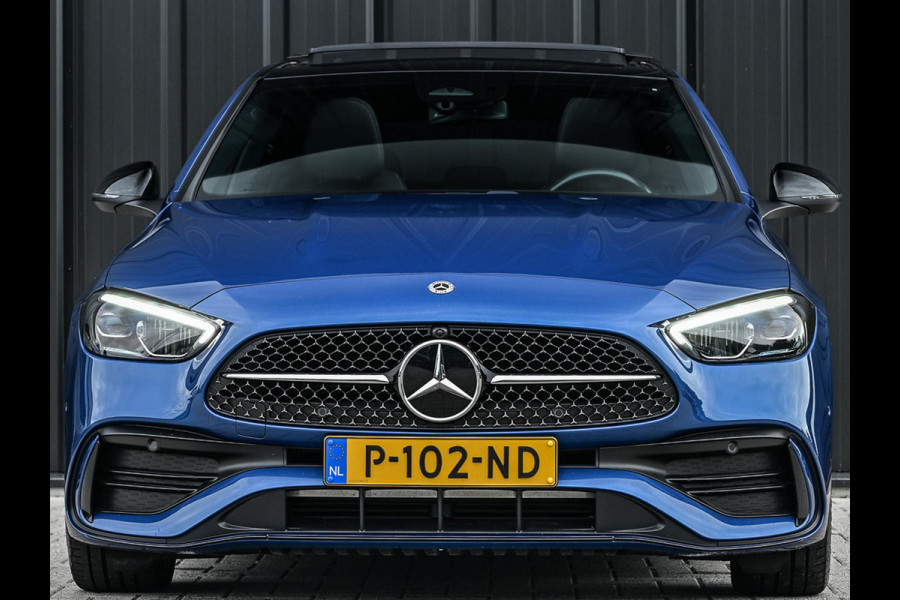 Mercedes-Benz C-Klasse 180 AMG Line | NL-Auto | Panoramadak | Night-Pakket | Ambiance Interieur | Camera | Elektr. Verst. Voorstoelen + Verwarming |