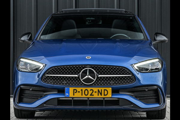 Mercedes-Benz C-Klasse 180 AMG Line | NL-Auto | Panoramadak | Night-Pakket | Ambiance Interieur | Camera | Elektr. Verst. Voorstoelen + Verwarming |