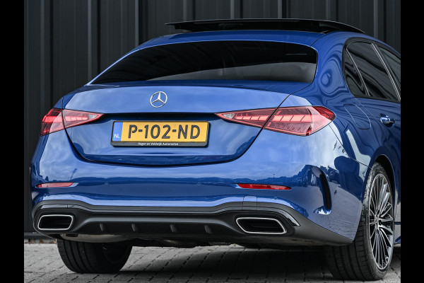Mercedes-Benz C-Klasse 180 AMG Line | NL-Auto | Panoramadak | Night-Pakket | Ambiance Interieur | Camera | Elektr. Verst. Voorstoelen + Verwarming |