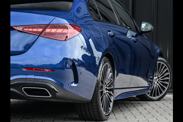 Mercedes-Benz C-Klasse 180 AMG Line | NL-Auto | Panoramadak | Night-Pakket | Ambiance Interieur | Camera | Elektr. Verst. Voorstoelen + Verwarming |