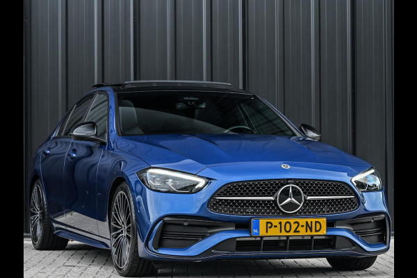 Mercedes-Benz C-Klasse 180 AMG Line | NL-Auto | Panoramadak | Night-Pakket | Ambiance Interieur | Camera | Elektr. Verst. Voorstoelen + Verwarming |