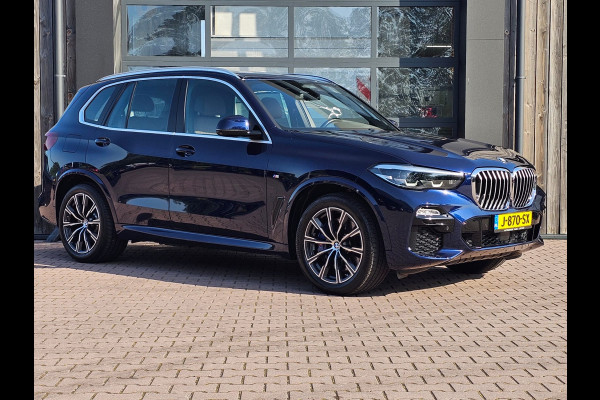BMW X5 xDrive45e High Executive M-Sport | Luchtvering |  Elek. trekhaak | Safety pack | Achterasbesturing | HUD | M aerodynamica | Leder |