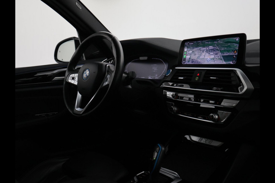BMW iX3 HIGH EXECUTIVE 80 kWh + TREKHAAK | PANORAMA | 360 CAMERA | ADAPTIVE CRUISE | SFEERVERLICHTING