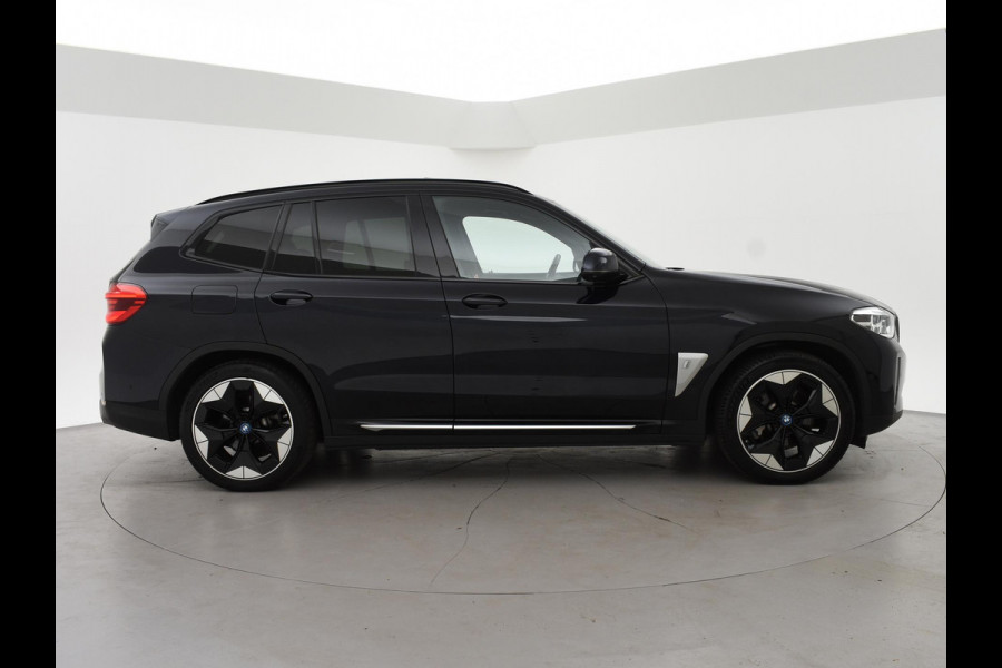 BMW iX3 HIGH EXECUTIVE 80 kWh + TREKHAAK | PANORAMA | 360 CAMERA | ADAPTIVE CRUISE | SFEERVERLICHTING