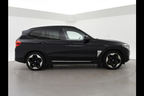 BMW iX3 HIGH EXECUTIVE 80 kWh + TREKHAAK | PANORAMA | 360 CAMERA | ADAPTIVE CRUISE | SFEERVERLICHTING