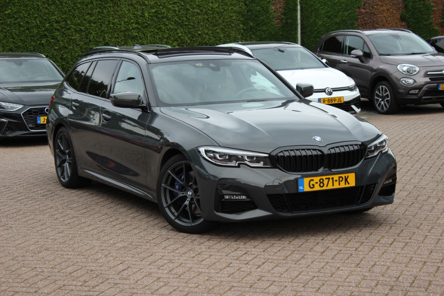 BMW 3 Serie Touring 330i High Exe. M Sport / Panoramadak / Camera / Leder / CarPlay / 19'' / Sportstoelen / Stoelverwarming / DAB / Cruise Control / Getint glas