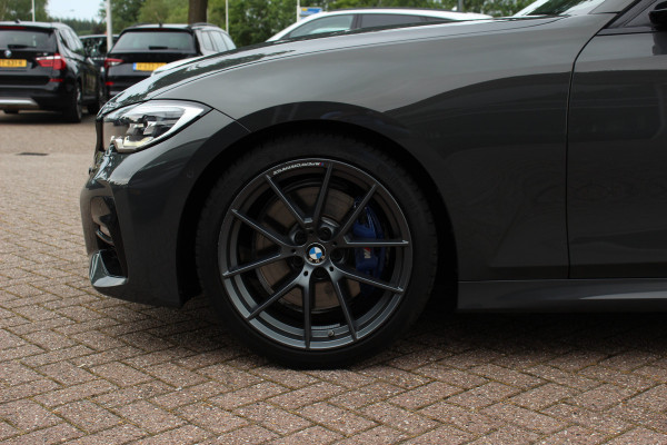 BMW 3 Serie Touring 330i High Exe. M Sport / Panoramadak / Camera / Leder / CarPlay / 19'' / Sportstoelen / Stoelverwarming / DAB / Cruise Control / Getint glas