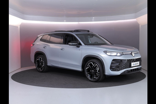 Volkswagen Tayron 1.5 eHybrid R-Line Edition | Private lease vanaf €851 | 204 pk Automaat (DSG) | Verlengde garantie | Navigatie | Panoramadak | Trekhaak (wegklapbaar) | Parkeersensoren (Park assist) | Rondomzicht camera | Stoelverwarming | R-Line |