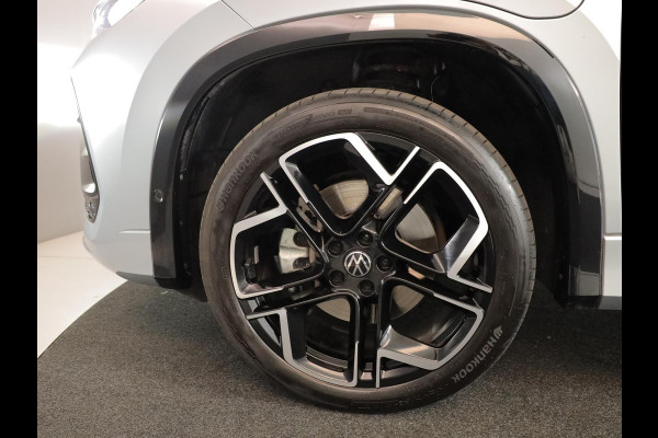 Volkswagen Tayron 1.5 eHybrid R-Line Edition | Private lease vanaf €851 | 204 pk Automaat (DSG) | Verlengde garantie | Navigatie | Panoramadak | Trekhaak (wegklapbaar) | Parkeersensoren (Park assist) | Rondomzicht camera | Stoelverwarming | R-Line |