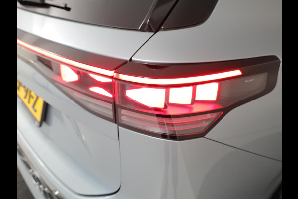 Volkswagen Tayron 1.5 eHybrid R-Line Edition | Private lease vanaf €851 | 204 pk Automaat (DSG) | Verlengde garantie | Navigatie | Panoramadak | Trekhaak (wegklapbaar) | Parkeersensoren (Park assist) | Rondomzicht camera | Stoelverwarming | R-Line |