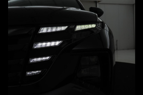 Hyundai Tucson 1.6 T-GDI PHEV N Line Sky 4WD | Panoramadak | Stoelverwarming | Leder/Alcantara | Camera | Adaptive cruise | Carplay | Full LED | Stuurverwarming | Keyless | Plug In