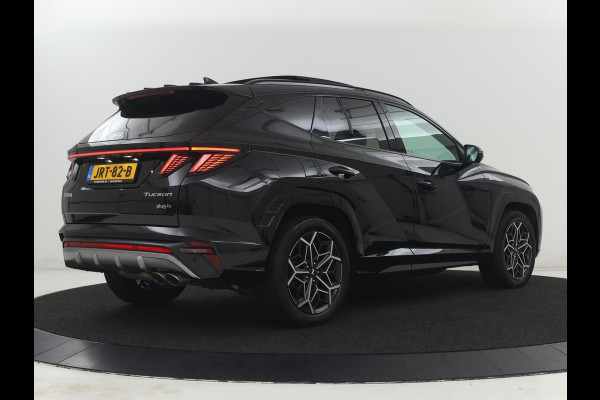 Hyundai Tucson 1.6 T-GDI PHEV N Line Sky 4WD | Panoramadak | Stoelverwarming | Leder/Alcantara | Camera | Adaptive cruise | Carplay | Full LED | Stuurverwarming | Keyless | Plug In