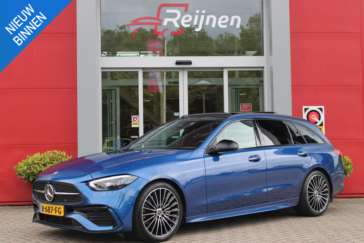 Mercedes-Benz C-Klasse Estate 200 218PK Launch Edition AMG Line | PANORAMISCH SCHUIF/KANTELDAK | LASER KOPLAMPEN | SFEERVERLICHTING | ELEKTRISCH VERSTELBARE VOORSTOELEN MET GEHEUGEN OP BEIDE STOELEN | STOELVERWARMING | ELEKTRISCHE STUURVERSTELLING MET GEHEUGEN | 19'' MULTISPAAKS LICHTMETALEN VELGEN | VERKEERSLICHTEN WEERGAVE | 360° CAMERA | DRAADLOOS APPLECARPLAY/ANDROID AUTO | DRAADLOZE TELEFOONLADER | WIDE SCREEN SCHERM | NIGHT PAKKET | DODEHOEK DETECTIE | EXTRA GETINTE ACHTERSTE RUITEN | PREMIUM AUDIO SYSTEM | ELEKTRISCH BEDIENBARE ACHTERKLEP | KEYLESS ENTRY |