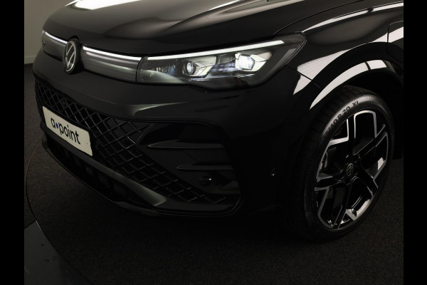 Volkswagen Tiguan 1.5 eHybrid R-Line Edition 272 pk Automaat (DSG) | Verlengde garantie | Navigatie | Panoramadak | Trekhaak (wegklapbaar) | Parkeersensoren (Park assist) | Rondomzicht camera | Lederen bekleding | R-Line |
