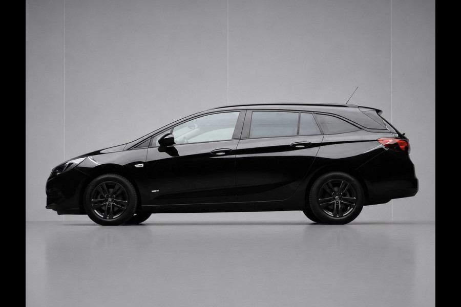 Opel Astra Sports Tourer 1.2 Design & Tech Sport (APPLE CARPLAY,NAVI,CAMERA,PDC,CLIMATE,CRUISE,GETINT,SPORTSTOELEN,LM VELGEN)