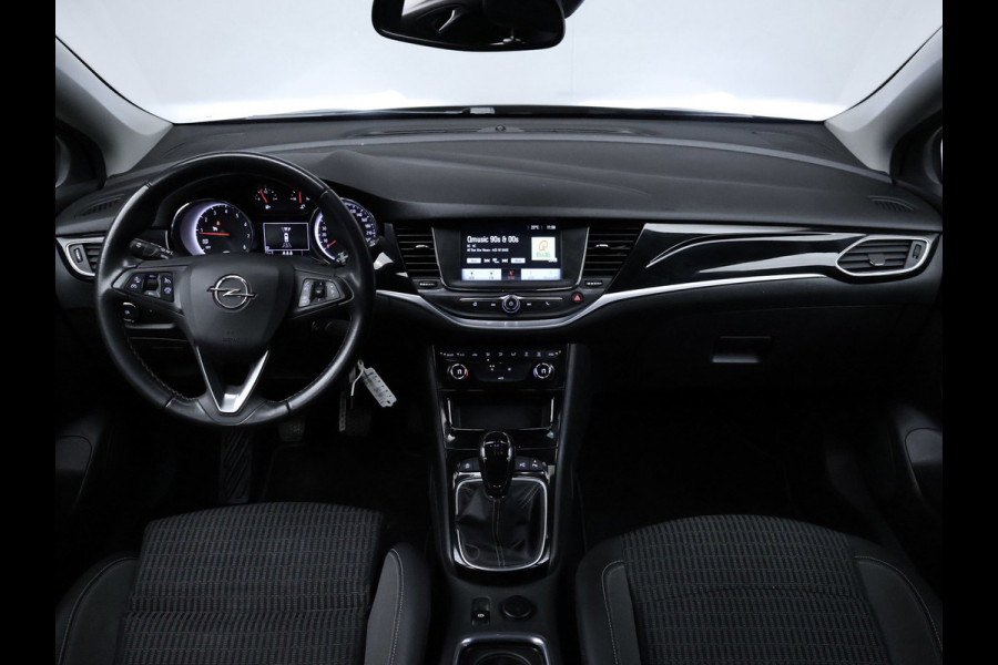 Opel Astra Sports Tourer 1.2 Design & Tech Sport (APPLE CARPLAY,NAVI,CAMERA,PDC,CLIMATE,CRUISE,GETINT,SPORTSTOELEN,LM VELGEN)