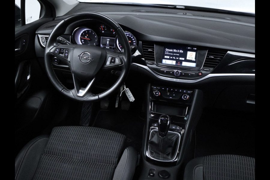 Opel Astra Sports Tourer 1.2 Design & Tech Sport (APPLE CARPLAY,NAVI,CAMERA,PDC,CLIMATE,CRUISE,GETINT,SPORTSTOELEN,LM VELGEN)