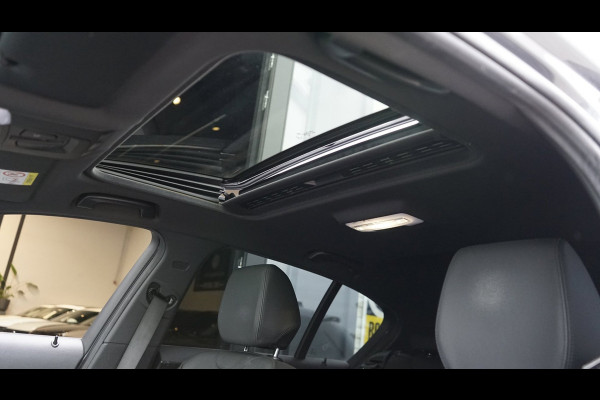 BMW 1-serie 118i M Sport Shadow Line AUTOMAAT|CRUISE|FULL LED|LEDER|NAVIGATIE|PANORAMA|STOELVERWARMING|TREKHAAK