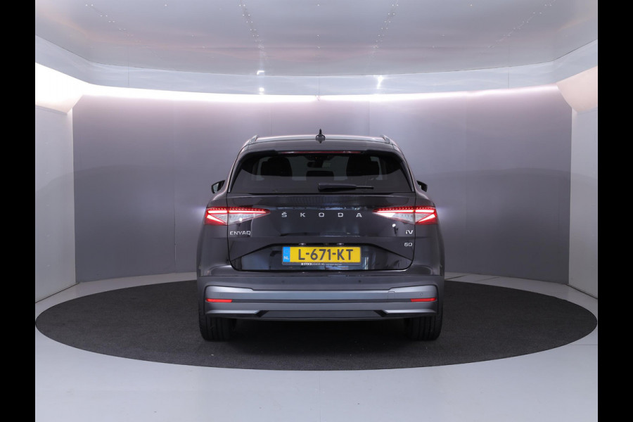 Škoda ENYAQ iV 60 180 pk | SOH 93,53% | Navigatie | Parkeersensoren | Achteruitrijcamera | Lederen bekleding | Matrix LED koplampen | Autom. airco (3 zones) | Stoelverwarming |