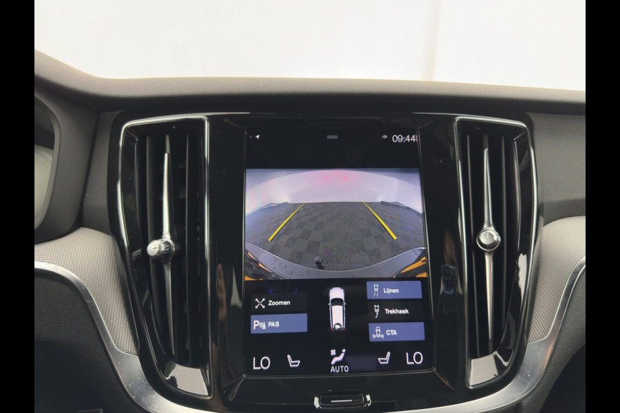Volvo V60 2.0 T8 Recharge AWD R-Design Black-Line {SoH-99%} (Plug-in) (INCL-BTW) Aut. *LEATHER-FABRIC | FULL-LED | MEMORY-PACK | HARMAN/KARDON | DIGI-COCKPIT | HEATED-SPORTSEATS | KEYLESS | DAB+ | NAVI-FULLMAP | PDC | CRUISE | HEAD-UP | TOWBAR | 19''
