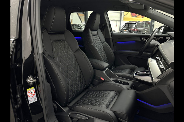 Audi Q4 e-tron 40 77 kWh S-Line #RS-Leder | Black-Edition | ACC | Sfeerverlichting | Virtual-Cockpit | Stoelverwarming | 3-Zone Clima | Virtual-Cockpit | Camera | LED | Getint Glas | Carplay | Autom. Parkeren |