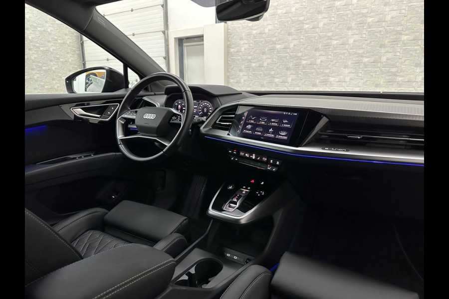 Audi Q4 e-tron 40 77 kWh S-Line #RS-Leder | Black-Edition | ACC | Sfeerverlichting | Virtual-Cockpit | Stoelverwarming | 3-Zone Clima | Virtual-Cockpit | Camera | LED | Getint Glas | Carplay | Autom. Parkeren |