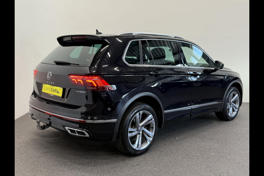 Volkswagen Tiguan 1.4 TSI eHybrid R-Line Business+ Automaat Trekhaak Panoramadak Navigatie IQ Light Stoel en Stuurverwarming Draadloze telefoonlader Digital Cockpit Climate Control Parkeersensoren 19 Inch