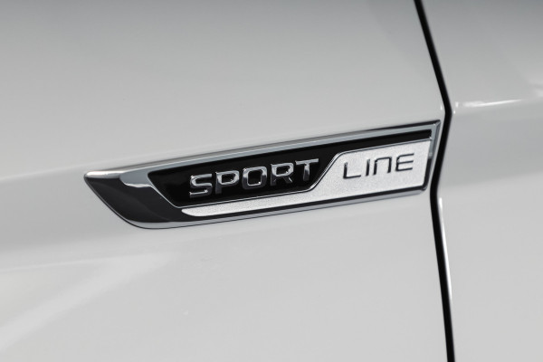 Škoda Karoq 1.5 TSI ACT Sportline Business 150 PK | Dig. Cockpit | Adapt. Cruise | Winterpakket | PDC | Camera | NAV + App. Connect | ECC | Elek. Trekhaak | LM 19" |