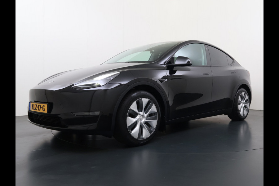 Tesla Model Y Long Range AWD 75kWh Warmtepomp Stoel+Stuur+Achterbankverwarming Premium Audio Leder Adap.Cruise Navi Camera's Ecc Keyless Voorv Elek.Achterklep AMD Ryzen™ Google Maps Dog+Kampeer modus Lmv 19" Led Privacy Glas Fabrieksgarantie op Accu en Motor tot 13-4-2031/192.000KM