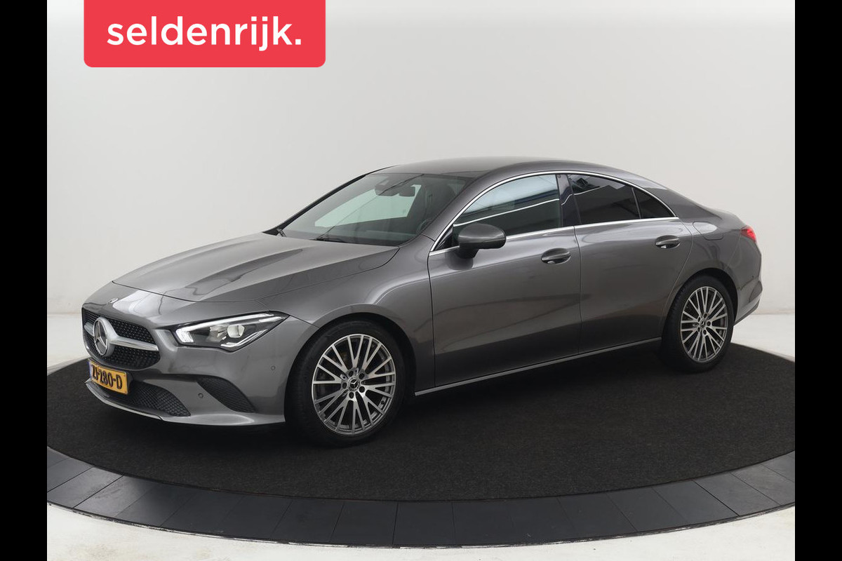 Mercedes-Benz CLA-Klasse 180 Business Solution Progressive | Stoelverwarming | Carplay | Sfeerverlichting | Half leder | Camera | Navigatie | Widescreen | Full LED | Park Assist | DAB | 18'' velgen | Cruise control