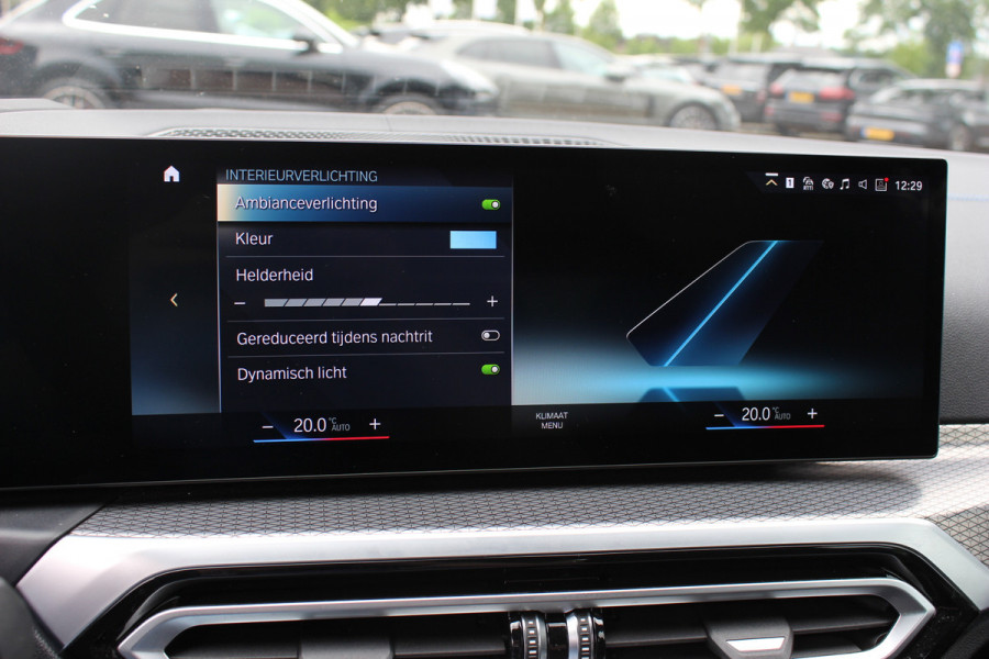 BMW i4 eDrive40 High Executive 84 kWh / SoH 95% / Trekhaak / Schuifdak / Camera / Head-up / Leder / 19'' / CarPlay / Stoelverwarming / Sfeerverlichting / Dodehoek / ACC