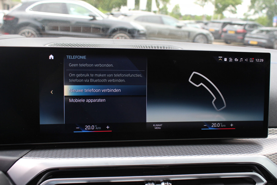 BMW i4 eDrive40 High Executive 84 kWh / SoH 95% / Trekhaak / Schuifdak / Camera / Head-up / Leder / 19'' / CarPlay / Stoelverwarming / Sfeerverlichting / Dodehoek / ACC