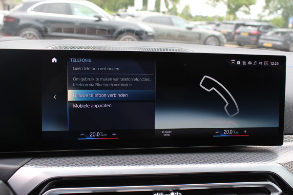 BMW i4 eDrive40 High Executive 84 kWh / SoH 95% / Trekhaak / Schuifdak / Camera / Head-up / Leder / 19'' / CarPlay / Stoelverwarming / Sfeerverlichting / Dodehoek / ACC