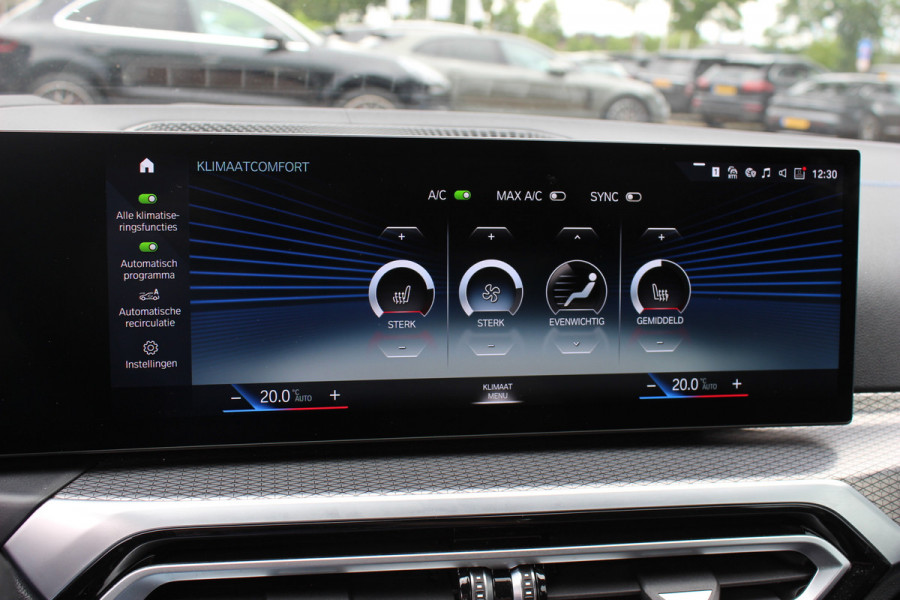 BMW i4 eDrive40 High Executive 84 kWh / SoH 95% / Trekhaak / Schuifdak / Camera / Head-up / Leder / 19'' / CarPlay / Stoelverwarming / Sfeerverlichting / Dodehoek / ACC