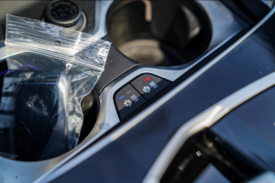 BMW X5 XDrive50e High Executive | X5M Kuipstoelen | Driving assistant Prof | HuD | Dravit Grau | Luchtvering | Stoelverkoeling |