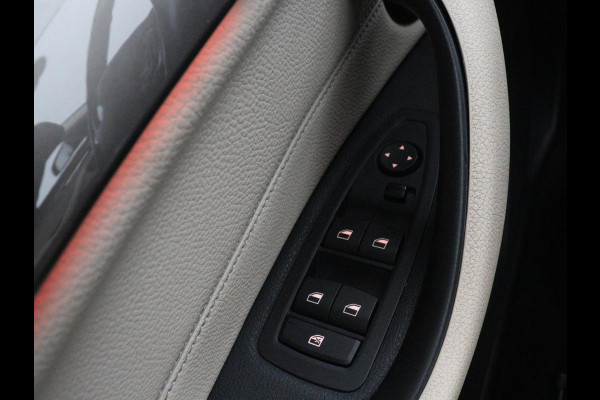 BMW X1 sDrive20i Orange Edition II | Leder | Trekhaak | Head-up | Park assist | Sfeerverlichting | Stoelverwarming | Climate control | Full LED | Navigatie |