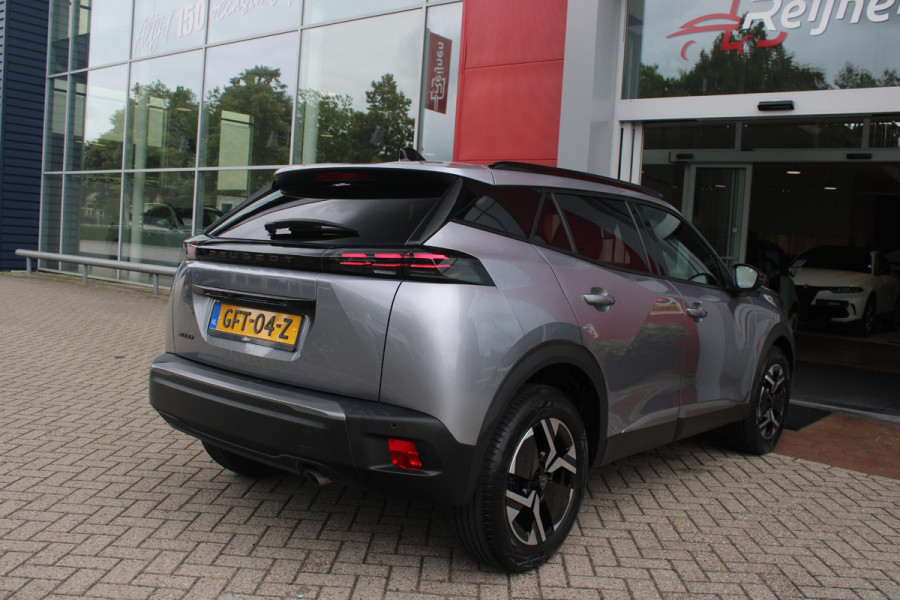 Peugeot 2008 1.2 100PK ALLURE | ACHTERUITRIJ CAMERA | NAVIGATIE | DRAADLOZE APPLE CARPLAY/ANDROID AUTO | PARKEERSENSOREN VOOR + ACHTER | CRUISE CONTROL | DAB+ RADIO | CLIMATE CONTROL | 17" LICHTMETALEN VELGEN | UNIEKE KM STAND! |