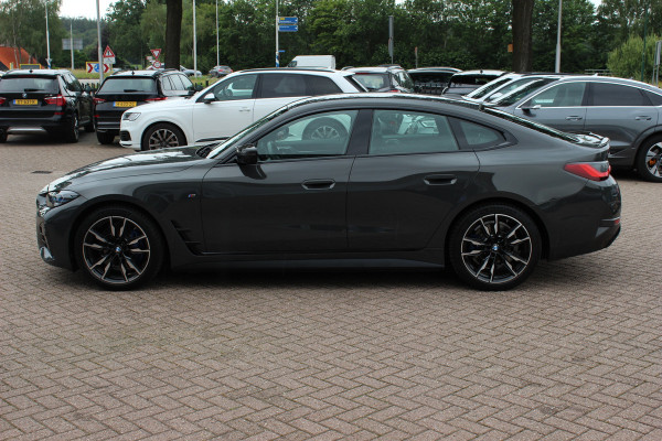 BMW i4 M50 High Executive 84 kWh / SoH 96,6% / 360Camera / Head-up / Leder / Harman Kardon / Carbon intr.+extr. / 19'' / CarPlay / Stoelverwarming / Dodehoek / DAB / Cruise Control Adaptief
