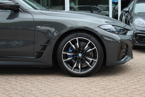 BMW i4 M50 High Executive 84 kWh / SoH 96,6% / 360Camera / Head-up / Leder / Harman Kardon / Carbon intr.+extr. / 19'' / CarPlay / Stoelverwarming / Dodehoek / DAB / Cruise Control Adaptief