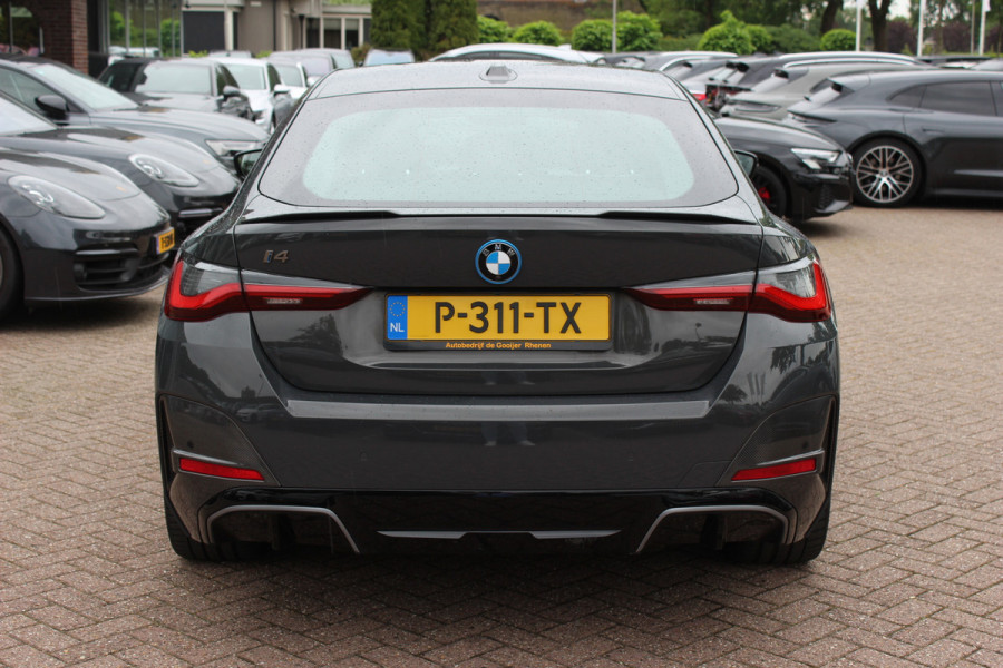 BMW i4 M50 High Executive 84 kWh / SoH 96,6% / 360Camera / Head-up / Leder / Harman Kardon / Carbon intr.+extr. / 19'' / CarPlay / Stoelverwarming / Dodehoek / DAB / Cruise Control Adaptief
