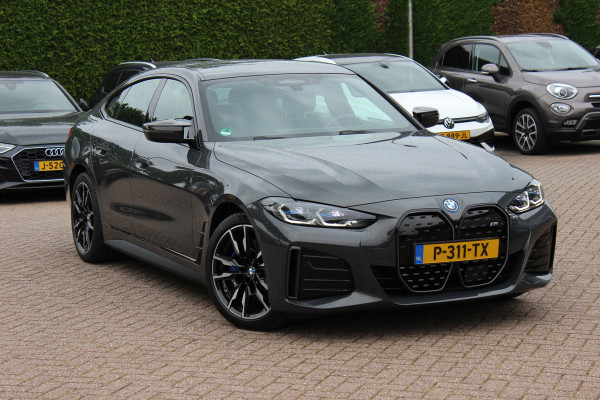 BMW i4 M50 High Executive 84 kWh / SoH 96,6% / 360Camera / Head-up / Leder / Harman Kardon / Carbon intr.+extr. / 19'' / CarPlay / Stoelverwarming / Dodehoek / DAB / Cruise Control Adaptief