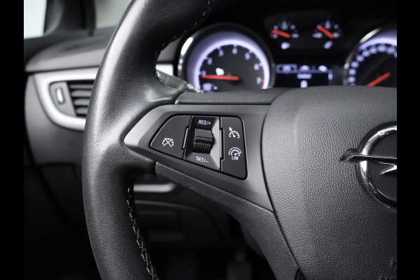 Opel Astra 1.2 Edition Sport (APPLE CARPLAY,NAVI,PDC,CRUISE,GETINT,SPORTSTOELEN,LM VELGEN,NETTE STAAT)