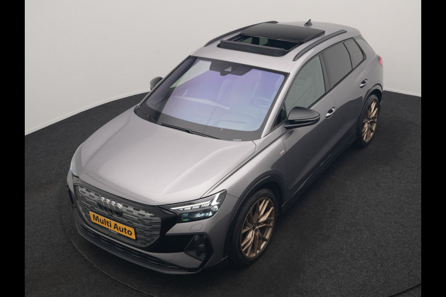 Audi Q4 e-tron 50 Quattro Edition One 2x S Line 77 kWh 300pk Dealer O.H. | Panodak | Head Up | Adaptive Cruise | Matrix LED | Camera | Lederen Sportstoelen Memory & Verwarmd | Keyless | Apple Carplay | Blis | DAB | 21"L.M |