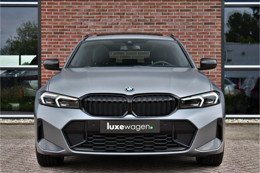 BMW 3 Serie Touring 330e xDrive M-Sport Pro Frozen-Grey Pano Trekh El-zetel HUD Merino-leder 19inch Adp-onderstel