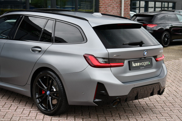 BMW 3 Serie Touring 330e xDrive M-Sport Pro Frozen-Grey Pano Trekh El-zetel HUD Merino-leder 19inch Adp-onderstel