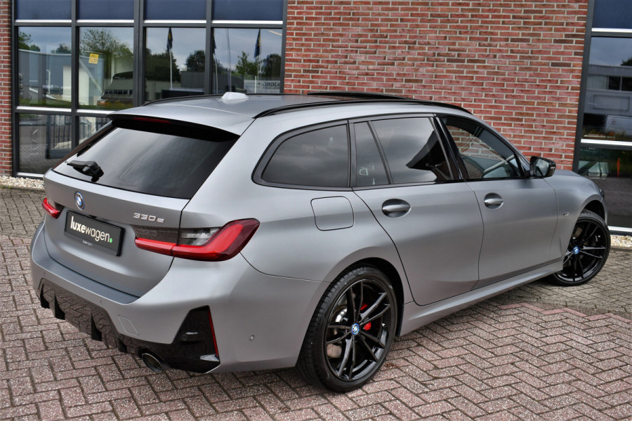 BMW 3 Serie Touring 330e xDrive M-Sport Pro Frozen-Grey Pano Trekh El-zetel HUD Merino-leder 19inch Adp-onderstel